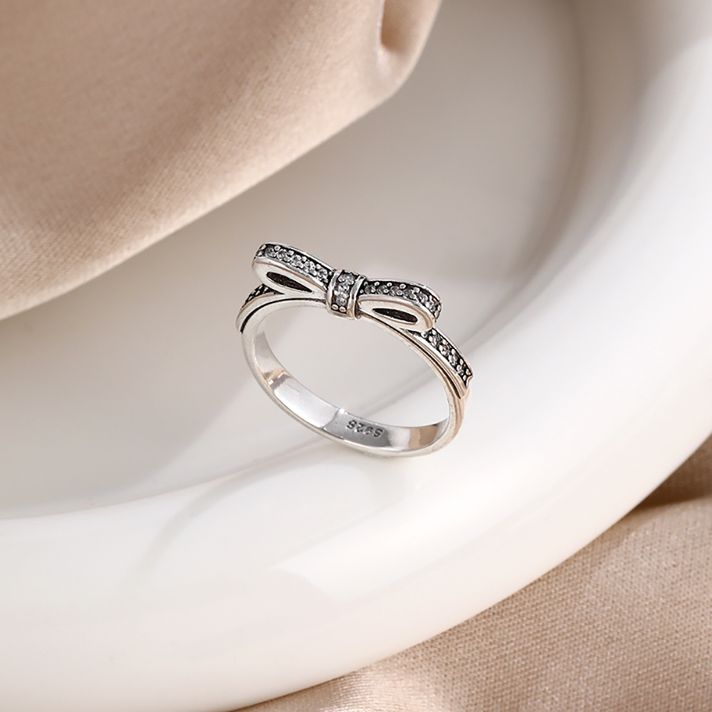 925 スターリングシルバーレッドピンクホワイト弓リング女性 - Tie Clip Silver のレビューと価格